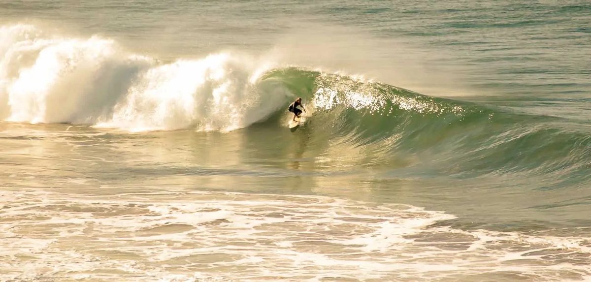 A clean barrel section on a winter swell, Awana (GBI) surf spot, Auckland / Rodney, New Zealand.