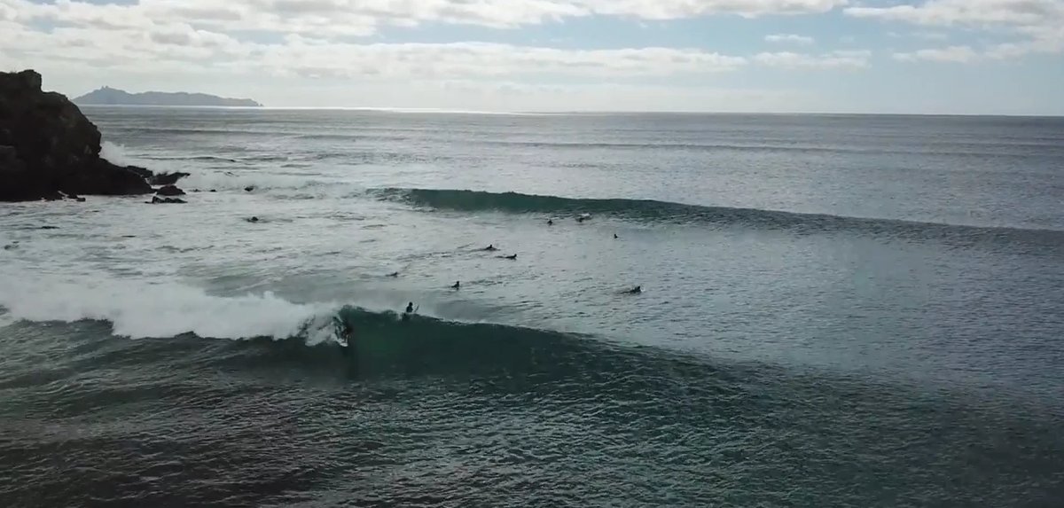 A clean left in the middle of the beach, Forestry surf spot, Auckland / Rodney, New Zealand.