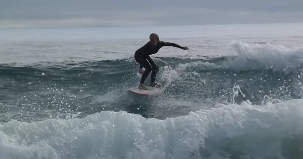 Riding a glassy wave at the Mount on a quieter morning, Mt Maunganui - Tay Street surf spot, Bay of Plenty, New Zealand.