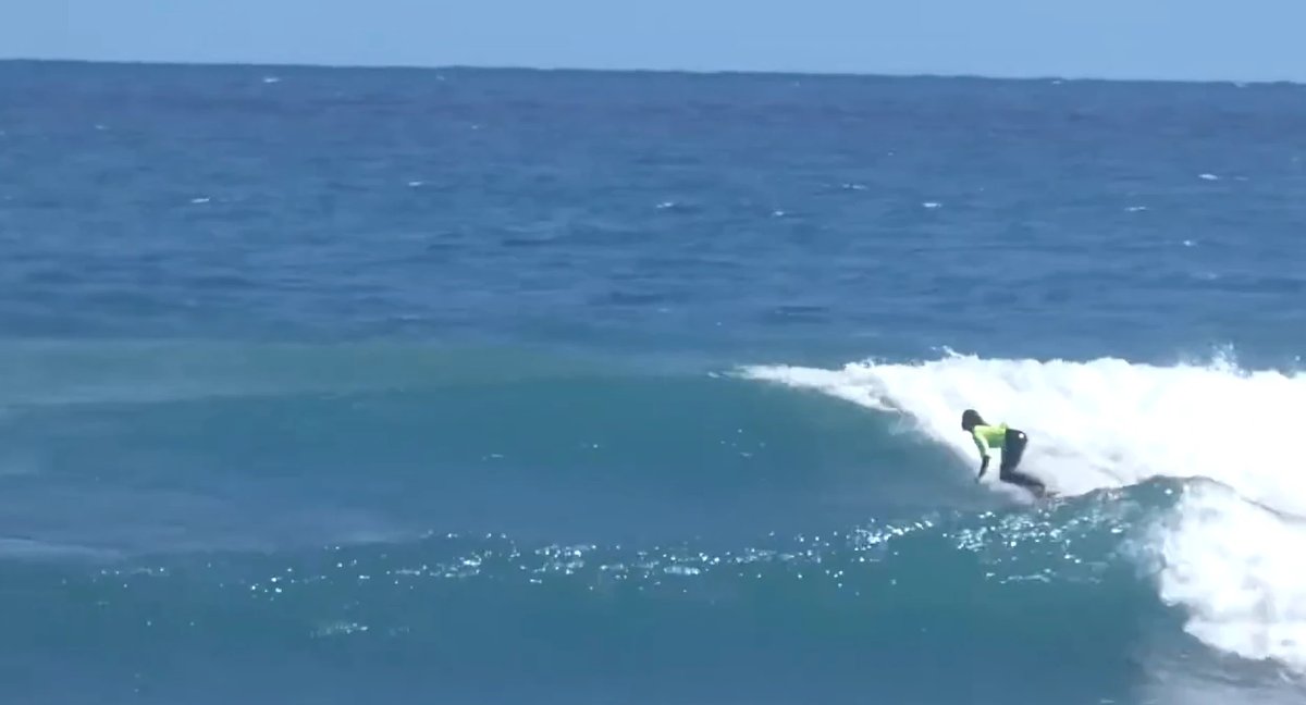 Dropping into a clean peak at Opunake Beach, Opunake surf spot, Taranaki / SH45, New Zealand.