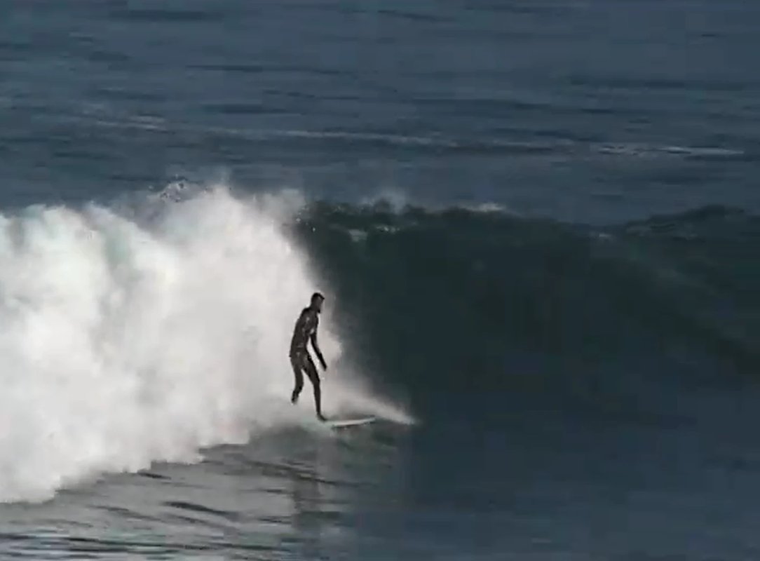 Trimming high on a clean little wave, the long right doing its thing, Ōraka / Colac Bay surf spot, Catlins / Southland, New Z
