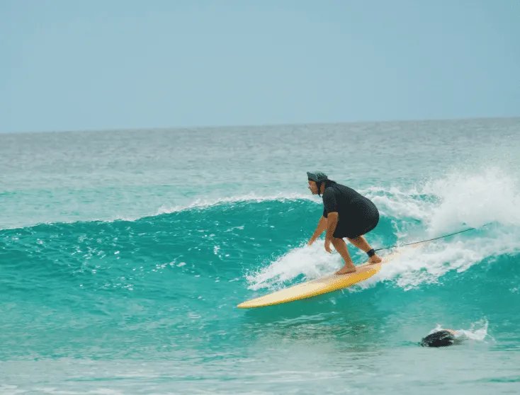 Tight turn on a clean inside wave, Orewa surf spot, Auckland / Rodney, New Zealand.