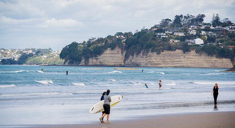 A quiet day at the north end, cliffs behind, Orewa surf spot, Auckland / Rodney, New Zealand.
