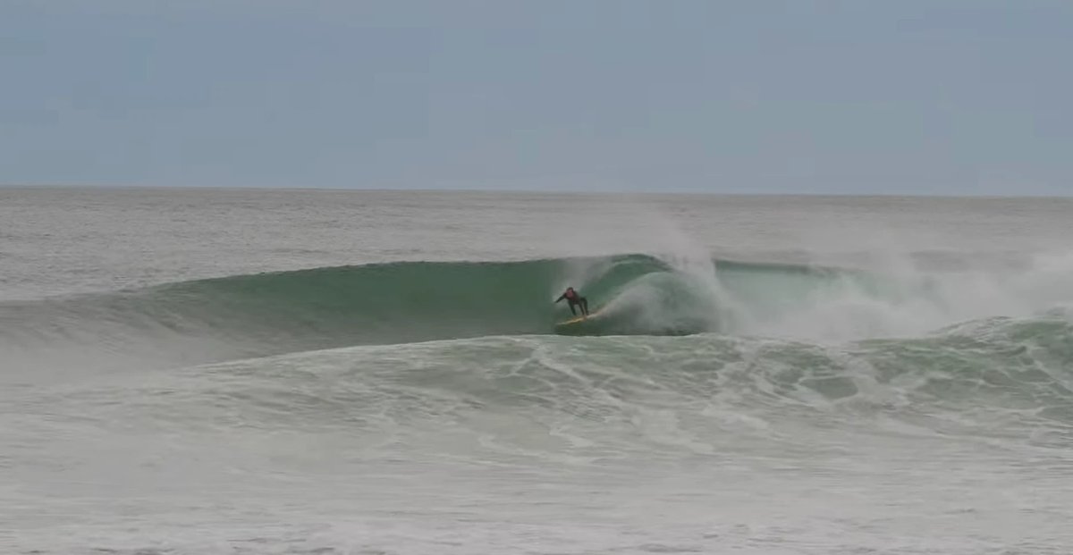 Pulling into a clean Schnappers barrel as the bank lines up on a solid swell, Schnappers Point surf spot, Marlborough / Nelso