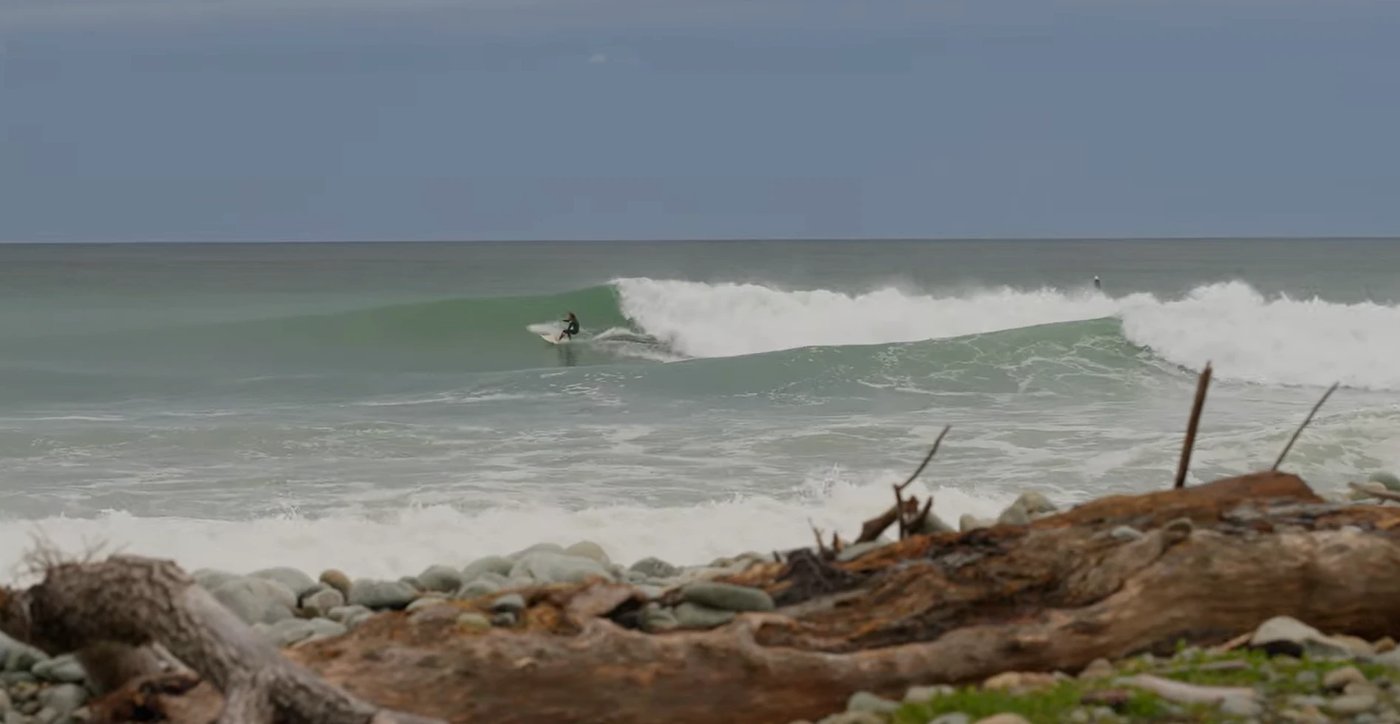 A clean right peels past the cobble and driftwood beach, the wild edge of the Boulder Bank that keeps this wave a local secre